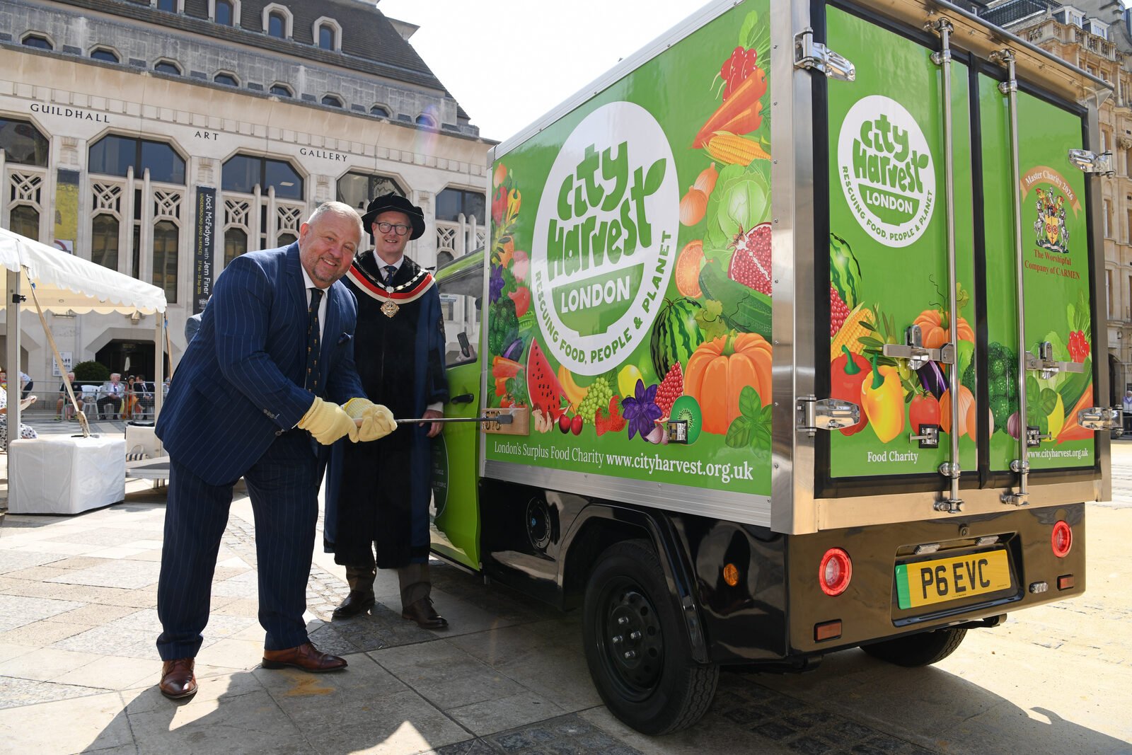 The City Harvest CitySprint being branded at the Cart Marking ceremony by the Worshipful Company of Carmen